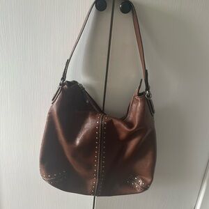 Brown Michael Kors purse with silver grommets